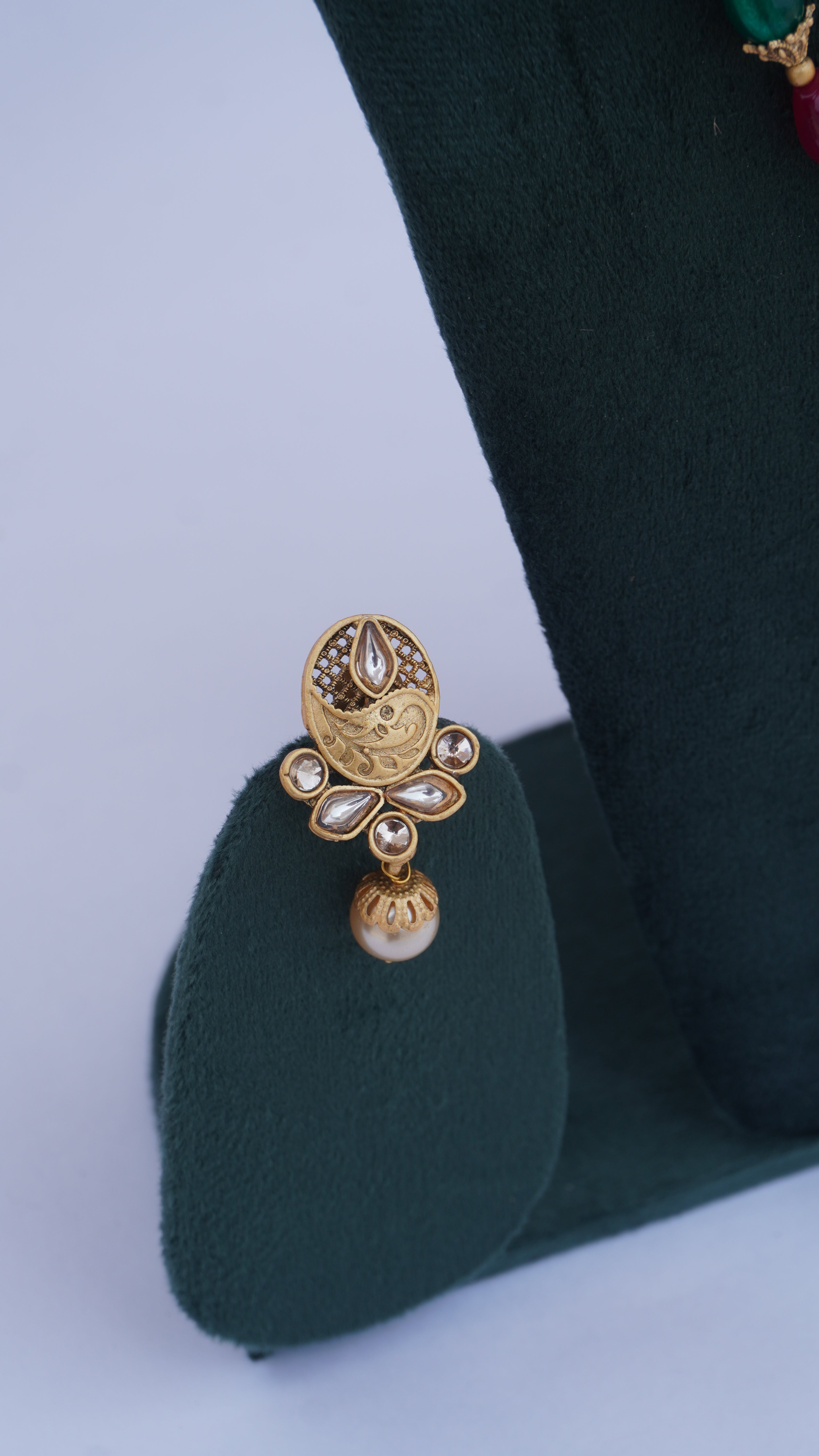 Traditional Ganesha Temple Necklace Set with Kundan Work and Pearl Drops – Red & Green Beads – Ashthi Jewels