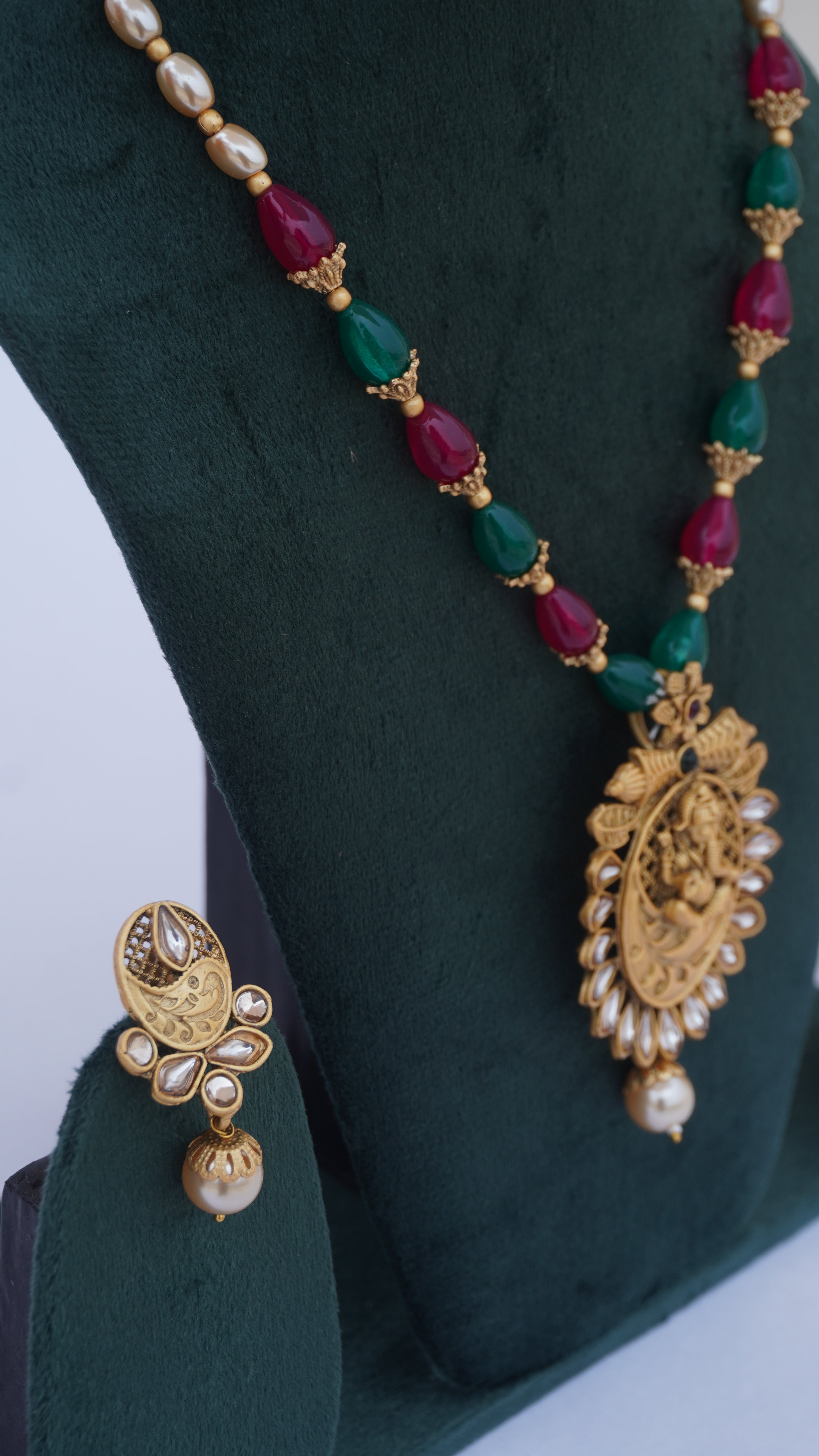 Traditional Ganesha Temple Necklace Set with Kundan Work and Pearl Drops – Red & Green Beads – Ashthi Jewels